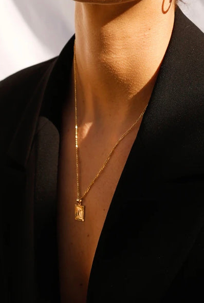 “I’ve been framed” initial necklace